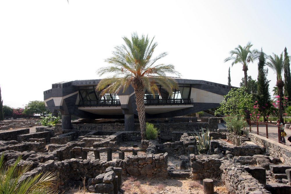 Residential homes from the 1st century at Capernaum. The modern structure in the background in a Catholic church built above the traditional site of the house of Peter where Jesus healed many people (Matthew 8:14-16).